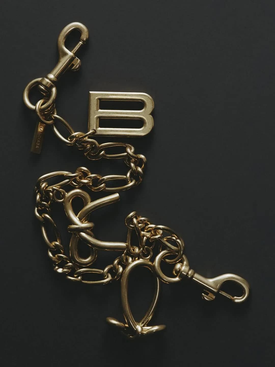 Balenciaga Frames Polished Jewelry Signatures Through a Raw Social Lens - Image 3