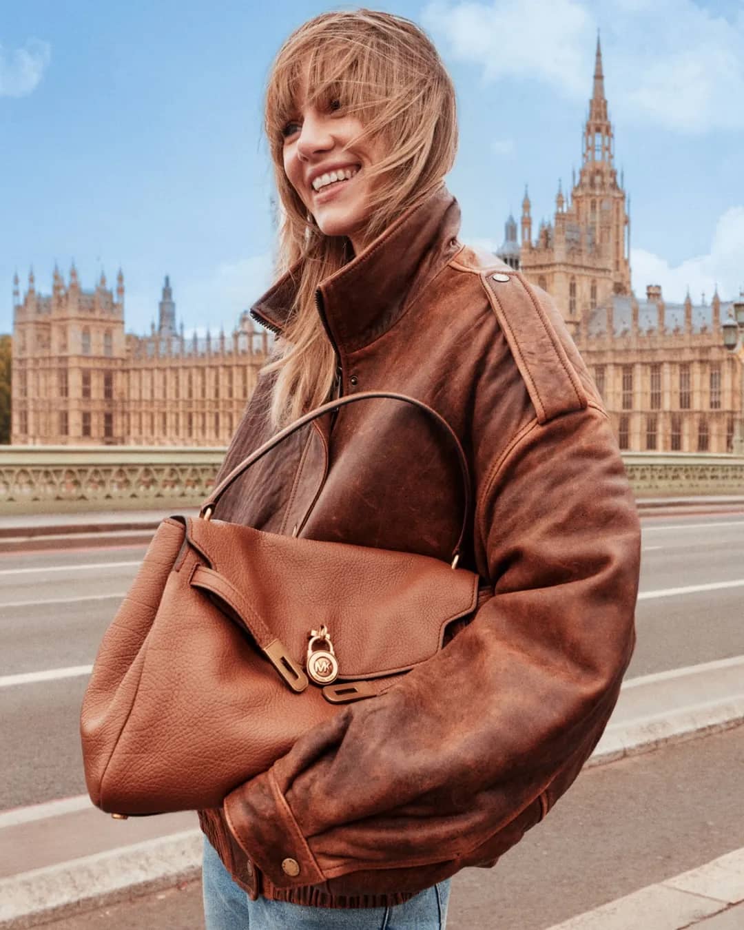 Michael Kors Softens the Hamilton Satchel Through Suki Waterhouse in London - Image 1